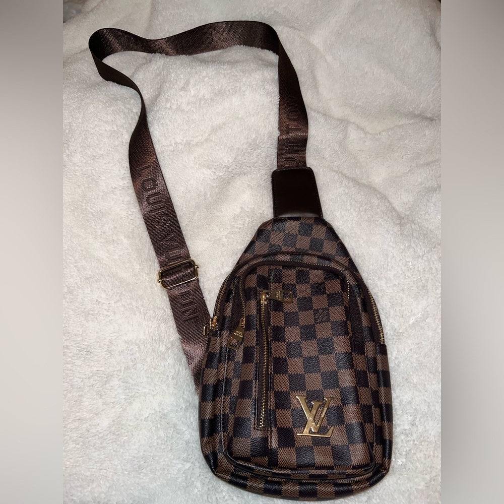 Authentic Louis Vuitton crossbody brown belt bag. Very lightly used.